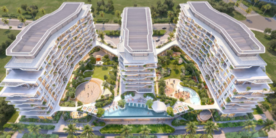 Aerial view of Flora Isle located at the heart of Dubai Islands, surrounded by lush greenery. 