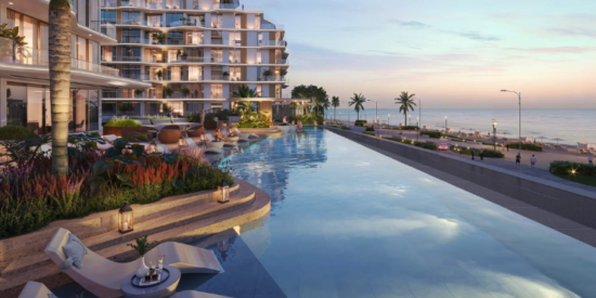 Infinity pool with panoramic views of the Arabian Gulf at Flora Isle, offering a relaxing retreat. 