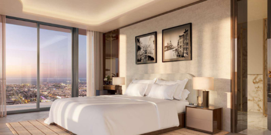 Mr. C Residences Downtown master bedroom with city views. 