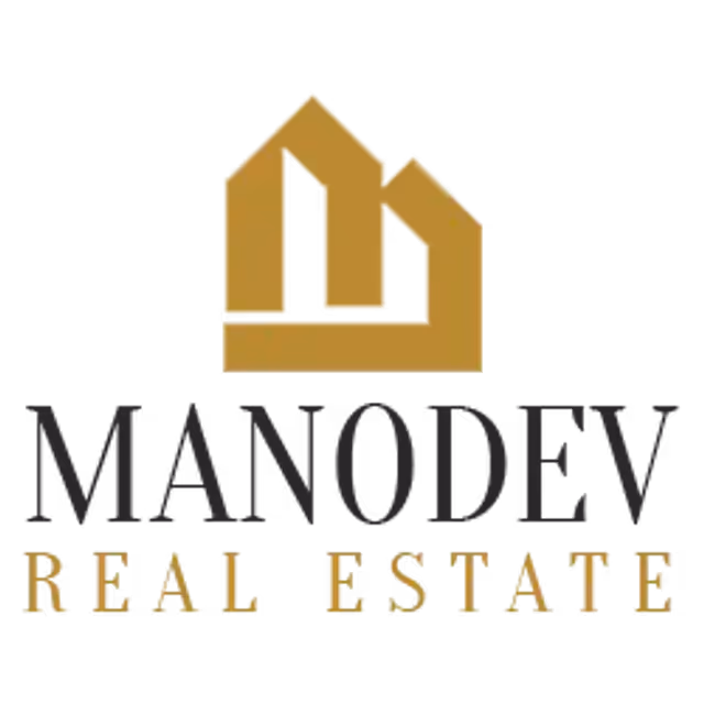 Manodev Real Estate logo